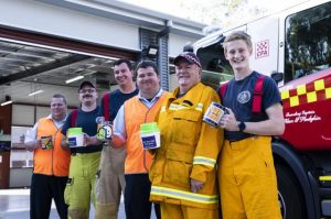 Fireys rattle tins for Good Friday Appeal