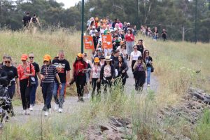 ‘It’s not acceptable’: crowd walks to end violence at Lillydale Lake