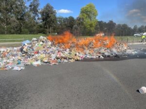 Recycling truck dumps load in Lilydale after fire